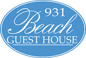 Logo of 931 Beach Guest House in a blue oval design.
